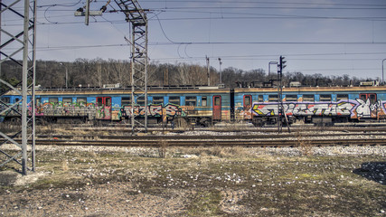Passenger train covered with graffiti