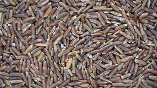 Rotating red rice  background