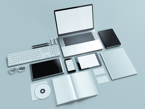 Computer, laptop, digital tablet, mobile phone, virtual headset and newspaper on grey background. IT concepts .