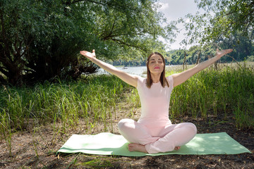 beautiful young woman doing yoga.