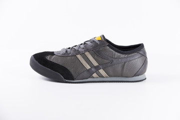 Female Black Sneaker on White Background, Isolated Product, Top View, Studio.