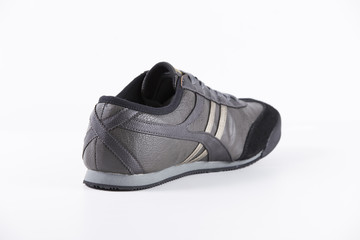 Female Black Sneaker on White Background, Isolated Product, Top View, Studio.