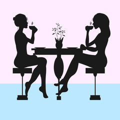 Silhouettes of two women drinking tea or coffee 