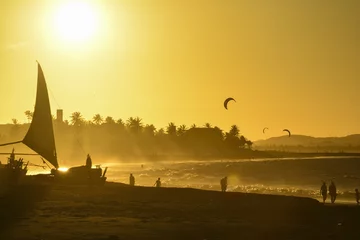 Crédence de cuisine en verre imprimé Couleur miel Sunset at Cumbuco Beach. Kite surfers on the sea, Ceara State, Brazil