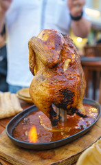 A chicken grill with spicy sauce