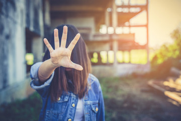 Woman bondage in angle of abandoned building image blur , stop violence against Women,...