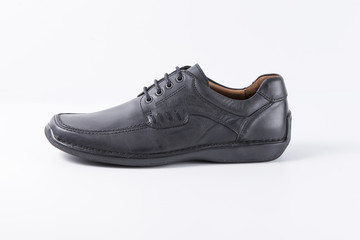 Male Black Shoe on White Background, Isolated Product, Top View, Studio.