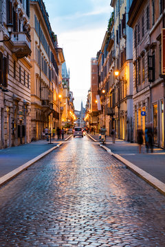 Fototapeta Old Roman street at sunset