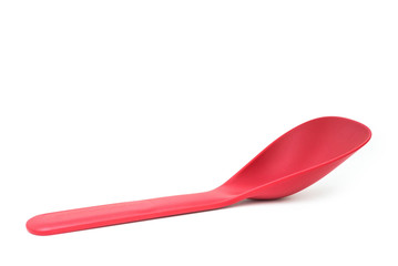 Plastic serving spoon isolated on white