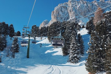 Fototapeta na wymiar View on Italian Dolomites in Winter with ski lift 