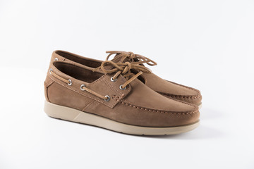Male Brown Shoes on White Background, Isolated Product, Top View, Studio.