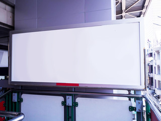 Blank billboard or poster located in the .Electric train