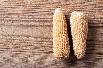 Raw corn on the table