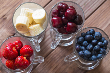 Fresh fruits for cocktails glasses / concept.
