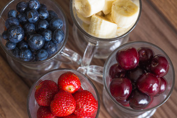 Fresh fruits for cocktails glasses / concept.