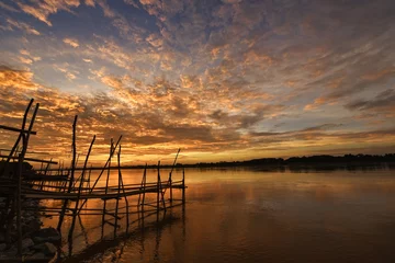 Zelfklevend Fotobehang Sunset on the Mekong River beautifully. © sirisakboakaew