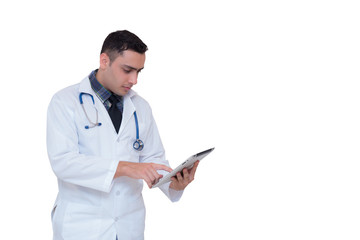 Doctor holding a tablet computer while using it isolated on white background