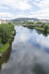 Obraz premium Landscape, Miño river passing through Orense Roman city located in Galicia. Spain