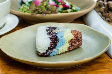 Colorful Rice on wooden table, Selective focus.