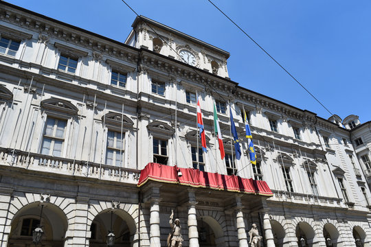 The city hall of Turin in Italy: an old classic palace made in white marble.