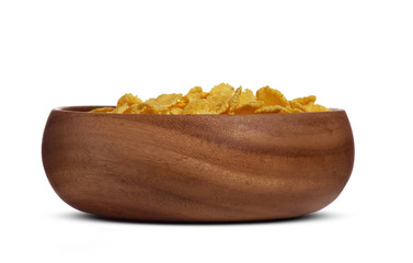 Corn flakes in a wooden bowl