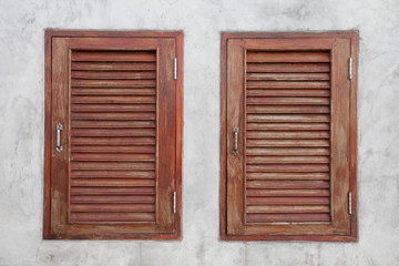 wooden window on concrete wall