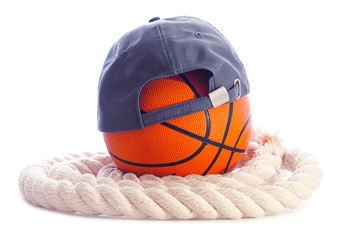 Basketball, cap and rope on a white background