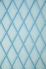 Blue wall with a diamond pattern