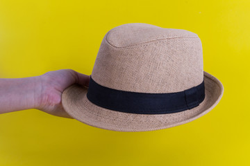 Straw Hat on yellow background
