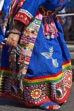 Detail of clothing worn by members of a Tinkus dancing group performing at the Carnaval Andino con la Fuerza del Sol in Arica, Chile.