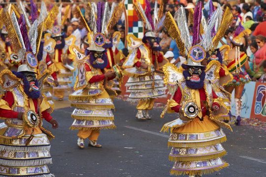 Morenada dance group in traditional Andean costume performing at the annual  Carnaval Andino con la Fuerza del Sol in Arica, Chile. Stock Photo | Adobe  Stock
