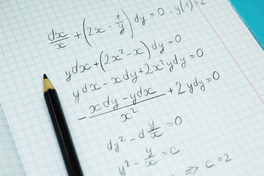 Mathematical examples and calculations in a notebook for lectures. Science and education.