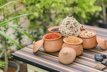 Thai herbs for spa in pot on wood table,massage,relax