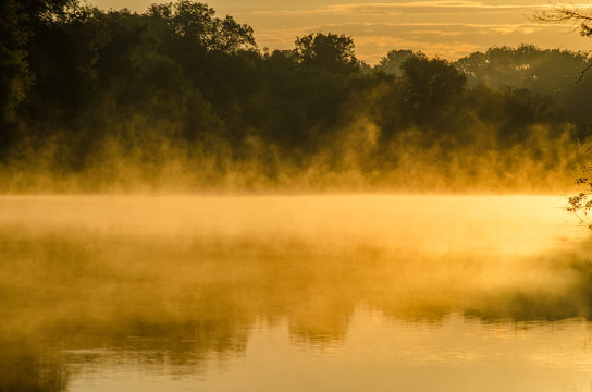 Fog on the river creates the illusion of boiling water