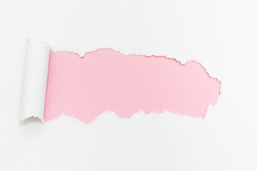 Breakthrough paper hole on isolated white background.
