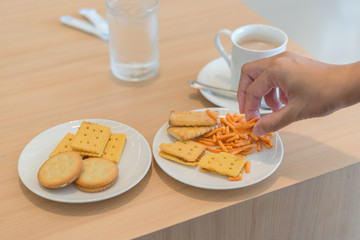 Hand hold cracker on table,for service customers