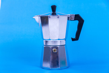 Moka pot on blue background