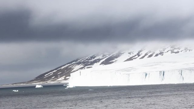 Glacier and permanent snowdrift (annuals) mountainous Champ Island, Franz-Josef Land
