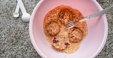 Nice cookie in bowl with sugar