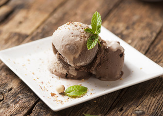 Fresh Chocolate ice cream on a plate close up