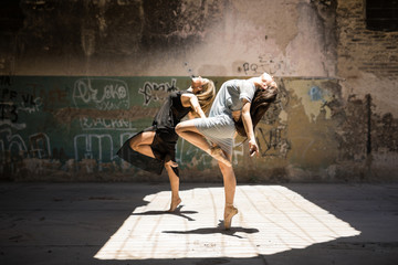 Naklejka na ściany i meble Female dancers performing together