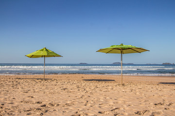 Geriba Beach in Buzios, Brazil. Two umbrellas
