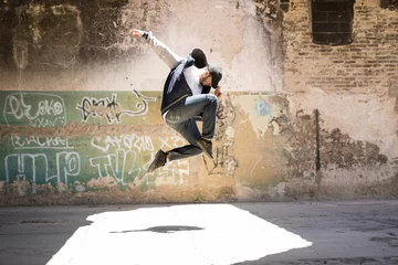 Foto op Plexiglas Male urban dancer in the air © AntonioDiaz