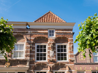 Facade of old house in fortified town of  Woudrichem, Netherlands