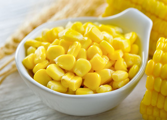 corn in a bowl on wood