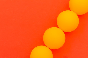 yellow tennis ball on a red background