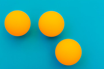yellow tennis ball on a blue background