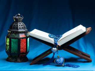 the islamic holy book, in dark background