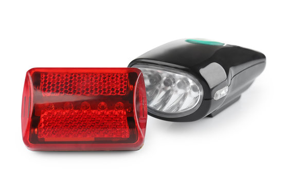 Fototapeta Safety lights for bicycle on white background