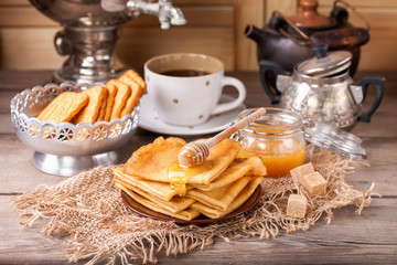 Pancakes with honey. Selective focus